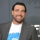 "Travis Kelce's jaw-dropping transformation! The Chiefs star tight end stuns in his first public appearance in weeks with a fresh new look that's got everyone talking!