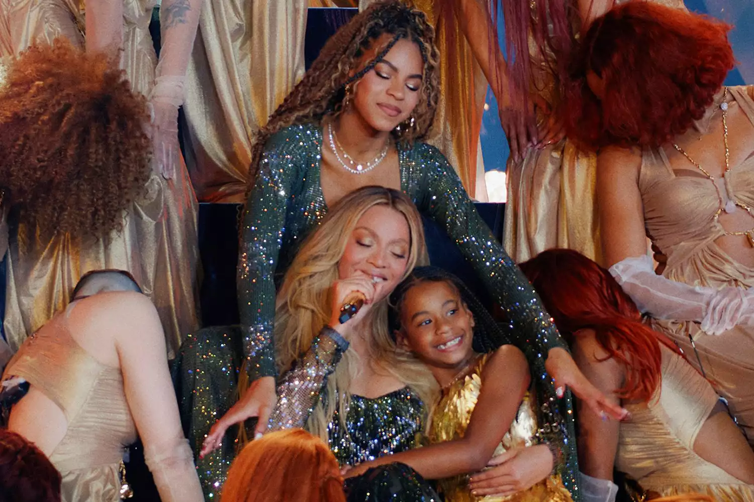 Cowboy Carter: Beyoncé’s Daughter Rumi, 7, Makes Rare Appearance During Live Show with Mom as Big Sister Blue Ivy, 13, Towers over Both...see more