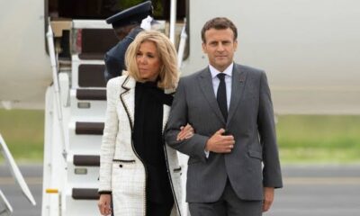 French Pres. Emmanuel Macron appeared to be pushed in the face by his wife Brigitte Macron as they arrived in Vietnam, the first stop of a Southeast Asia tour.